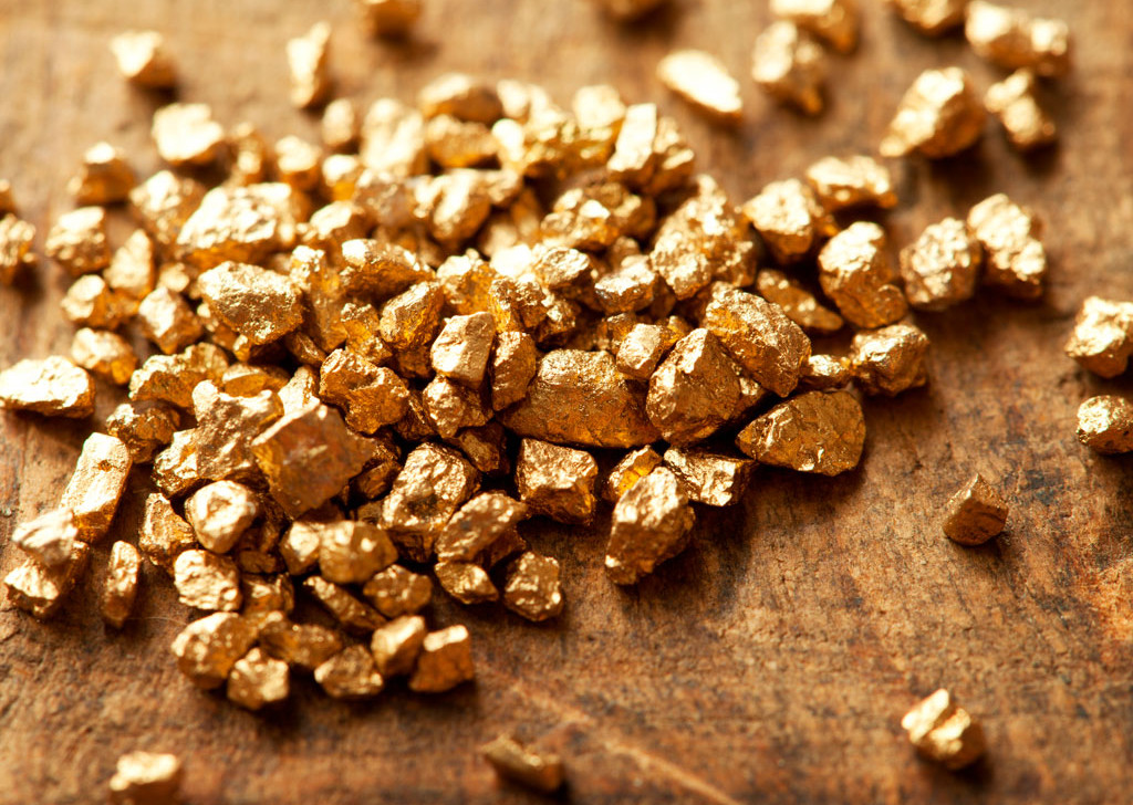 Ouro Brilha com Expectativas de Corte de Juros nos EUA, Apesar de Divergências no Fed